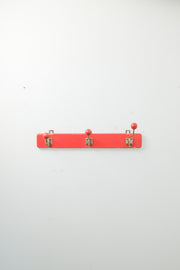 Red Wall-Mounted Coat Rack / 赤い壁付けコートラック