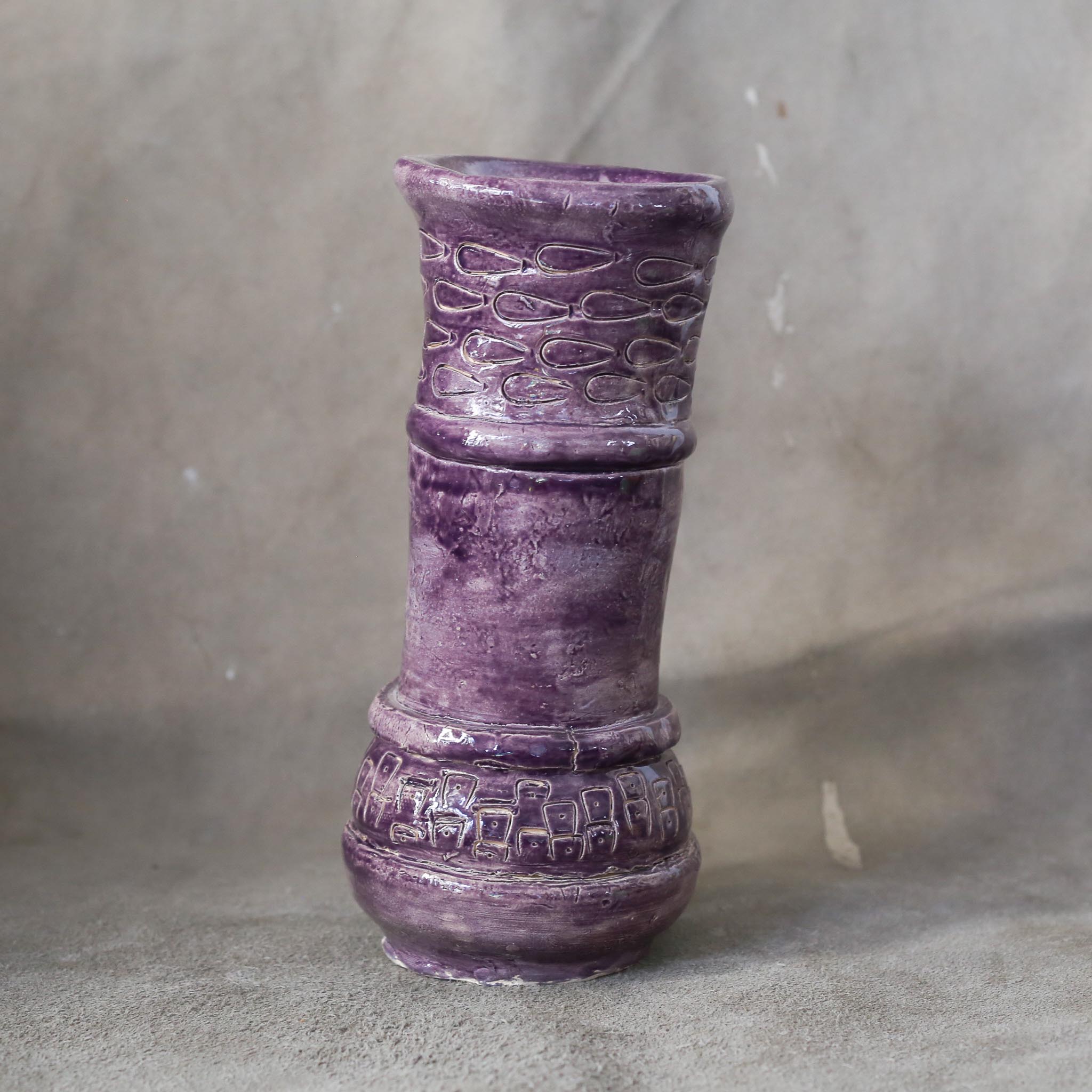 Ceramic purple vase