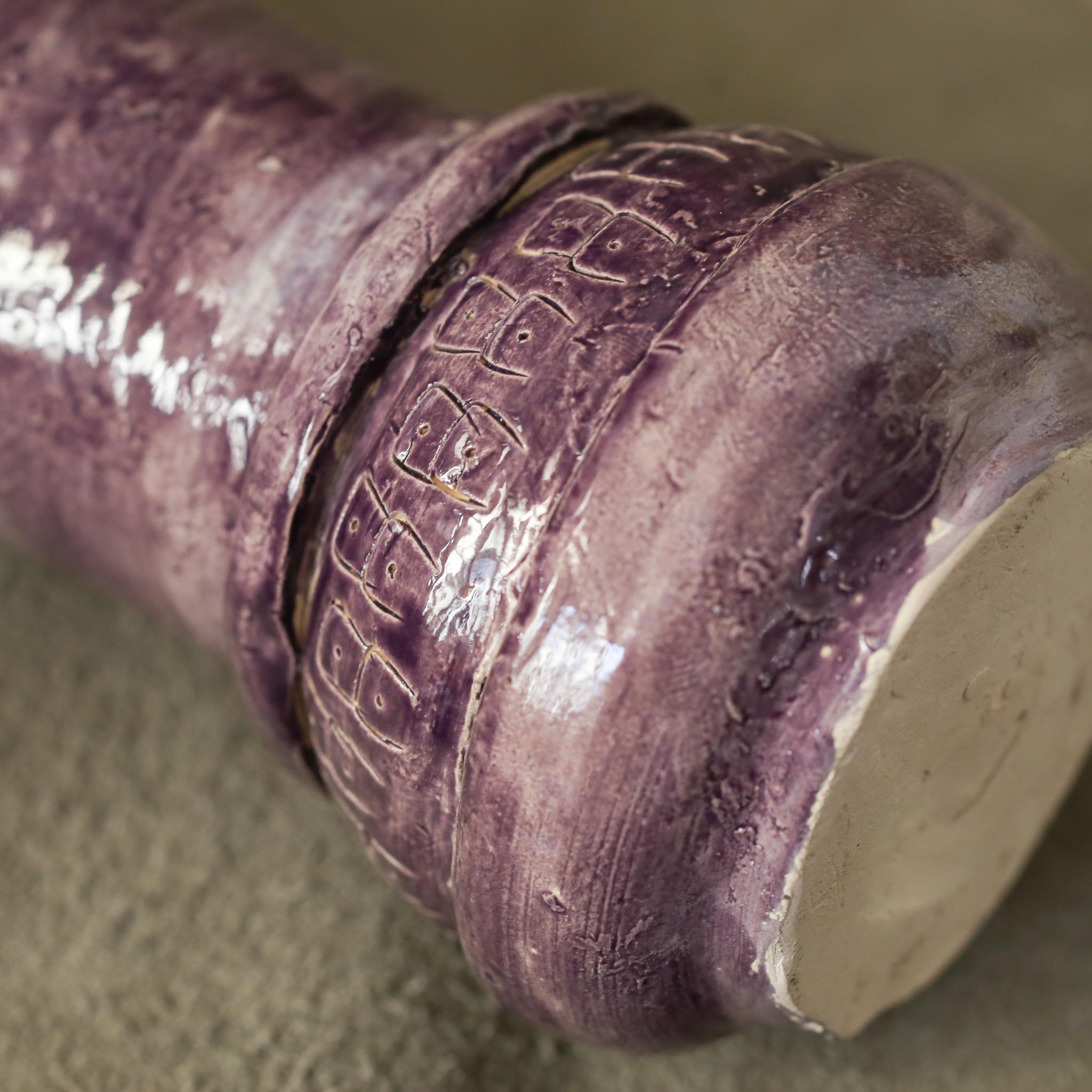Ceramic purple vase